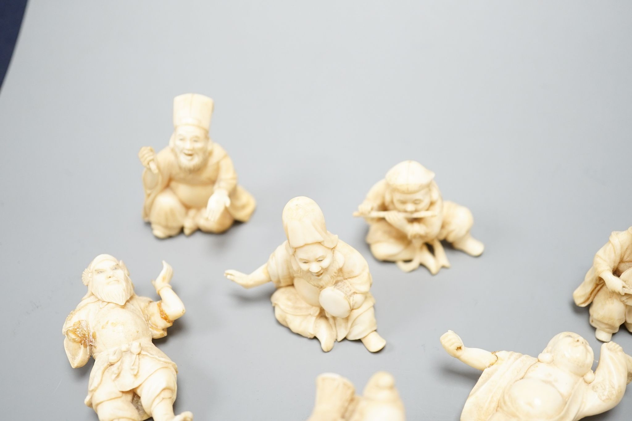 A set of seven Japanese ivory okimono of the seven gods of Happiness, Meiji period, unsigned, tallest 4cm